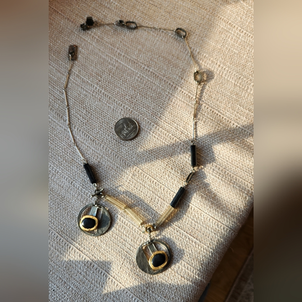 Modern Gold and Black Necklace with Pendant Elements